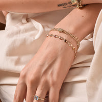 10K Gold Three-Row Chain Bracelet with Faceted Hearts