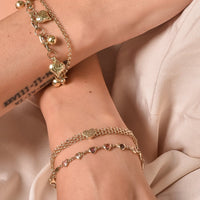 10K Gold Three-Row Chain Bracelet with Faceted Hearts